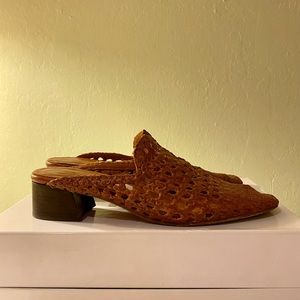 Miista leather woven mule with a slight block heel